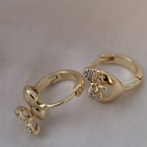 Gold tone earrings for pieced ears.